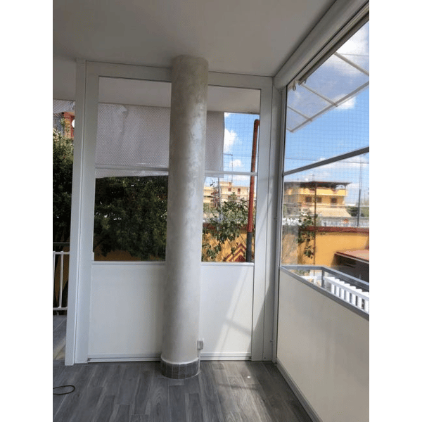 Tenda Cristal su misura per balconi e verande con cassonetto da 120mm e  steccature frangivento